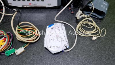 GS Corpuls3 Slim Defibrillator Ref : 04301 (Powers Up) with Corpuls Patient Box Ref : 04200 (Powers Up) with Pacer, Oximetry, ECG-D, ECG-M, CO2, CPR, NIBP and Printer Options, 4 and 6 Lead ECG Leads, SPO2 Finger Sensor, Hose, Paddle Lead, CO2 Cable, 3 x B - 4