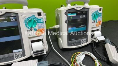 2 x Philips Heartstart MRx Defibrillators (Both Power Up) Including ECG and Printer Options, 2 x Paddle Leads, 2 x Test Loads, 2 x 3 Lead ECG Leads, 2 x Philips M3539A Modules and 2 x Philips M3538A Li-Ion Batteries *SN US00583348 / US00583344* - 4