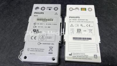 2 x Philips Heartstart MRx Defibrillators (Both Power Up) Including ECG and Printer Options, 2 x Paddle Leads, 2 x Test Loads, 2 x 3 Lead ECG Leads, 2 x Philips M3539A Modules and 2 x Philips M3538A Li-Ion Batteries *SN US00583348 / US00583344* - 8