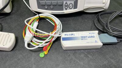 2 x Philips Heartstart MRx Defibrillators (Both Power Up) Including ECG and Printer Options, 2 x Paddle Leads, 2 x Test Loads, 2 x 3 Lead ECG Leads, 2 x Philips M3539A Modules and 2 x Philips M3538A Li-Ion Batteries *SN US00583345 / US00584766* - 5