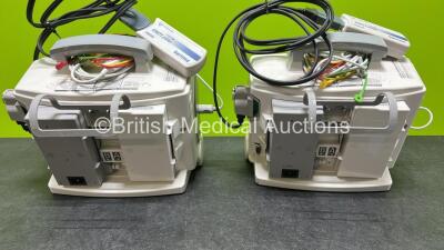 2 x Philips Heartstart MRx Defibrillators (Both Power Up) Including ECG and Printer Options, 2 x Paddle Leads, 2 x Test Loads, 2 x 3 Lead ECG Leads, 2 x Philips M3539A Modules and 2 x Philips M3538A Li-Ion Batteries *SN US00583345 / US00584766* - 7