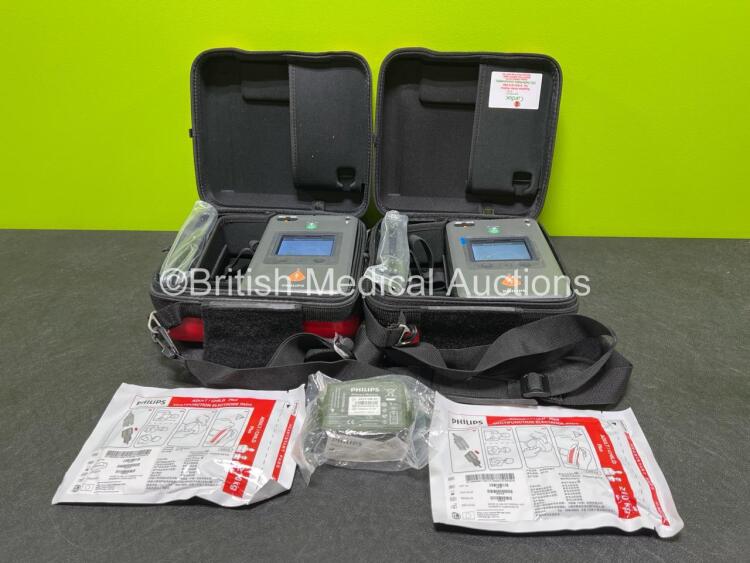 2 x Philips Heartstart FR3 Defibrillators in Carry Cases with 2 x Electrode Packs *Both Expired* and 3 x LiMnO2 Batteries *Install Before - 2027 / 2027 / 2024* **SN C16H-00010 / C18D-00352**