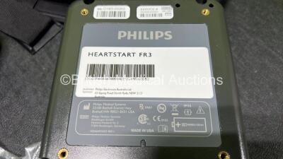 2 x Philips Heartstart FR3 Defibrillators in Carry Cases with 2 x Electrode Packs *Both Expired* and 3 x LiMnO2 Batteries *Install Before - 2027 / 2027 / 2024* **SN C16H-00010 / C18D-00352** - 5