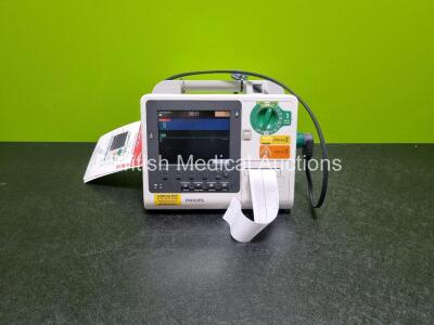 Philips Heartstart XL+ Defibrillator (Powers Up) Including ECG and Printer Options with Paddle Lead