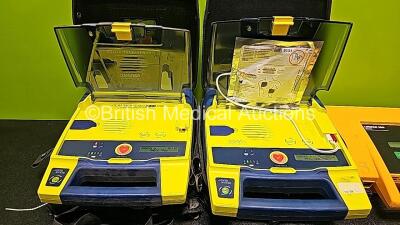 Job Lot Including 2 x Cardiac Science Powerheart AED G3 Automated External Defibrillators in Carry Case (Both Power Up) and 1 x Medtronic Physio Control Lifepak 500 Automated External Defibrillator (No Power Due to Suspected Flat Battery) - 3