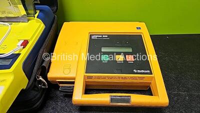 Job Lot Including 2 x Cardiac Science Powerheart AED G3 Automated External Defibrillators in Carry Case (Both Power Up) and 1 x Medtronic Physio Control Lifepak 500 Automated External Defibrillator (No Power Due to Suspected Flat Battery) - 4