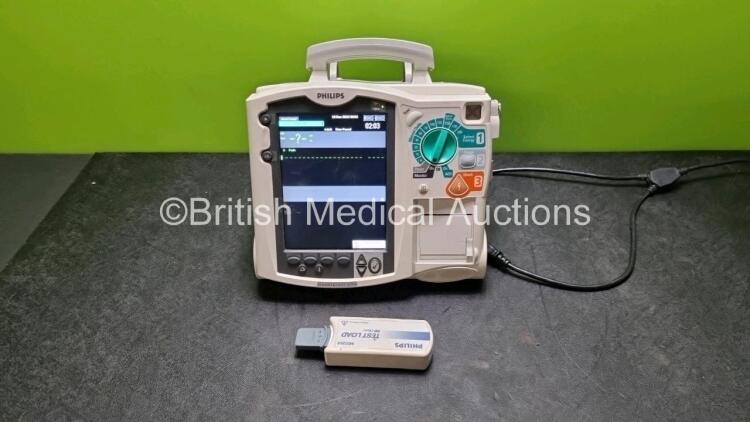 Philips Heartstart MRx Defibrillators (Both Power Up) Including Pacer ,ECG, C02 and Printer Options with 1 x Philips M3725A Test Load