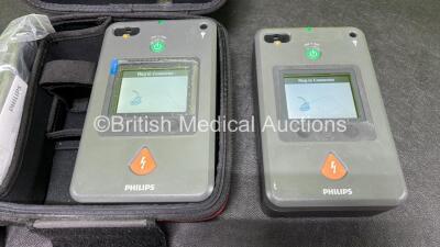 2 x Philips Heartstart FR3 Defibrillators with 2 x Electrode Packs *Both in Date* 3 x LiMnO2 Batteries *Install Before - 2027 / 2025 / 2024* and 1 x Carry Case *SN C17A-00164 / C18G-00750* - 2