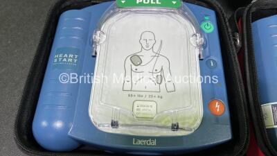 2 x Laerdal Heartstart HS1 Defibrillators with 2 x Lithium Batteries *Install Before 2024 / 2025* and 2 x Electrode Pads *Expire 2024 / 2025* in Carry Cases (Both Power Up) *SN A05A-02217 / A05A-02241* - 4