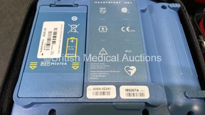 2 x Laerdal Heartstart HS1 Defibrillators with 2 x Lithium Batteries *Install Before 2024 / 2025* and 2 x Electrode Pads *Expire 2024 / 2025* in Carry Cases (Both Power Up) *SN A05A-02217 / A05A-02241* - 7