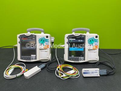 2 x Philips Heartstart MRx Defibrillators (Both Power Up, 1 x Scratched Screen - See Photos) Including ECG and Printer Options, 2 x Paddle Leads, 2 x Test Loads, 2 x 3 Lead ECG Leads, 2 x Philips M3539A Modules and 2 x Philips M3538A Li-Ion Batteries *SN 