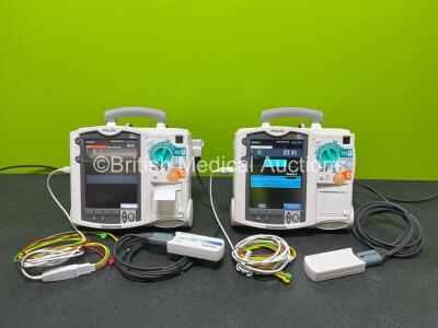 2 x Philips Heartstart MRx Defibrillators (Both Power Up, 1 x Scratched Screen - See Photos) Including ECG and Printer Options, 2 x Paddle Leads, 2 x Test Loads, 2 x 3 Lead ECG Leads, 2 x Philips M3539A Modules and 2 x Philips M3538A Li-Ion Batteries *SN