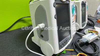 2 x Philips Heartstart MRx Defibrillators (Both Power Up, 1 x Scratched Screen - See Photos) Including ECG and Printer Options, 2 x Paddle Leads, 2 x Test Loads, 2 x 3 Lead ECG Leads, 2 x Philips M3539A Modules and 2 x Philips M3538A Li-Ion Batteries *SN - 6