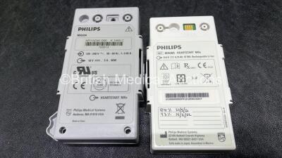 2 x Philips Heartstart MRx Defibrillators (Both Power Up, 1 x Scratched Screen - See Photos) Including ECG and Printer Options, 2 x Paddle Leads, 2 x Test Loads, 2 x 3 Lead ECG Leads, 2 x Philips M3539A Modules and 2 x Philips M3538A Li-Ion Batteries *SN - 8