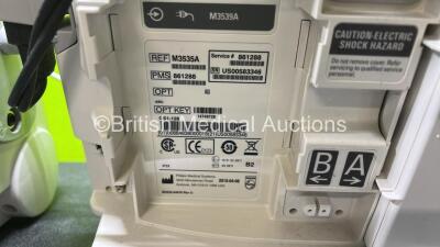 2 x Philips Heartstart MRx Defibrillators (Both Power Up, 1 x Scratched Screen - See Photos) Including ECG and Printer Options, 2 x Paddle Leads, 2 x Test Loads, 2 x 3 Lead ECG Leads, 2 x Philips M3539A Modules and 2 x Philips M3538A Li-Ion Batteries *SN - 10