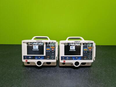 2 x Lifepak 20e Defibrillators / Monitors *Mfd - 2020 / 2016* (Both Power Up) Including Pacer, ECG and Printer Options with 2 x Li-ion Batteries *SN 48697293 / 44641952*