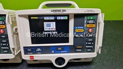 2 x Lifepak 20e Defibrillators / Monitors *Mfd - 2020 / 2016* (Both Power Up) Including Pacer, ECG and Printer Options with 2 x Li-ion Batteries *SN 48697293 / 44641952* - 2
