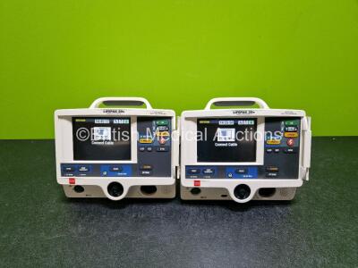 2 x Lifepak 20e Defibrillators / Monitors *Mfd - 2015 / 2016* (Both Power Up) Including ECG and Printer Options with 2 x Li-ion Batteries *SN 43966246 / 44646909*