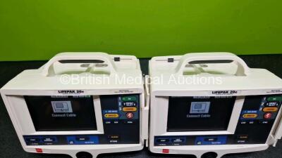 2 x Lifepak 20e Defibrillators / Monitors *Mfd - 2015 / 2016* (Both Power Up) Including ECG and Printer Options with 2 x Li-ion Batteries *SN 43966246 / 44646909* - 5