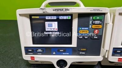 2 x Lifepak 20e Defibrillators / Monitors *Mfd - 2016 / 2016* (Both Power Up) Including ECG and Printer Options with 2 x Li-ion Batteries *SN 44606464 / 44646902* - 2