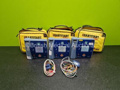 3 x Laerdal FR2+ Defibrillators (All Power Up, 2 x with Cut Bags) in Case with, 2 x 3 Lead ECG Leads, 3 x M3863A LiMnO2 Batteries *Install Before - 2025 / 2025 / 2019*