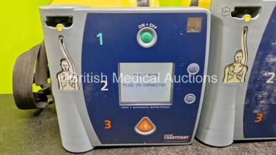 3 x Laerdal FR2 Heartstart Defibrillators (All Power Up) in Case with 3 x M3863A LiMnO2 Batteries *Install Before - 2027 / 2021 / 2025* - 2