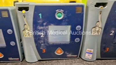 3 x Laerdal FR2 Heartstart Defibrillators (All Power Up) in Case with 3 x M3863A LiMnO2 Batteries *Install Before - 2027 / 2021 / 2025* - 3