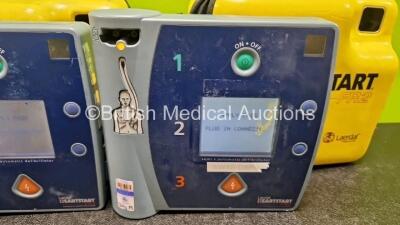 3 x Laerdal FR2 Heartstart Defibrillators (All Power Up) in Case with 3 x M3863A LiMnO2 Batteries *Install Before - 2027 / 2021 / 2025* - 4