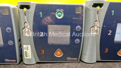 3 x Laerdal FR2 Heartstart Defibrillators (All Power Up) in Case with 3 x M3863A LiMnO2 Batteries *Install Before - 2026 / 2024 / 2025* - 3