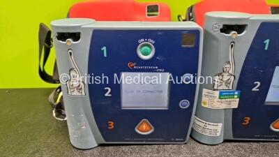 2 x Agilent FR2 Heartstream Defibrillators (Both Power Up) in Case with 2 x M3863A LiMnO2 Batteries *Install Before - 2027 / 2020* - 2