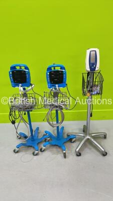 Job Lot Including 2 x GE ProCare Auscultatory Monitors on Stands with Power Supplies and 1 x Welch Allyn Spot Vital Signs Monitor on Stand with Power Supply (All Power Up)