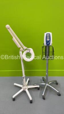 1 x Welch Allyn SPOT Vital Signs Monitor on Stand (Powers Up) and 1 x Luxo Patient Examination Lamp on Stand (Missing Bulb and 1 x Wheel)