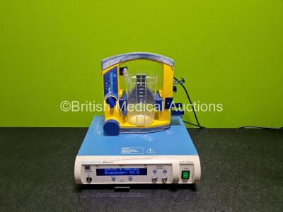 Mixed Lot Including 1 x Laerdal Suction Unit with Suction Cup (Powers Up, Cup Missing Lid and Damage to Casing - See Photo) 1 x Smith & Nephew Dyonics Power V3.0 Ref 7205841 Control Unit (Powers Up) *SN 7800115787 / XT528* **PLY**