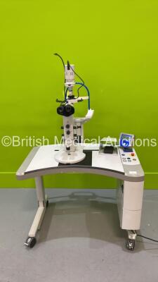 Haag Streit Bern BQ900 Slit Lamp on with Binoculars, 2 x 12,5x Eyepieces, Chin Rest on Meridian Microruptor V Motorized Table with Key (Powers Up with Good Bulb) *S/N QS 0502202*