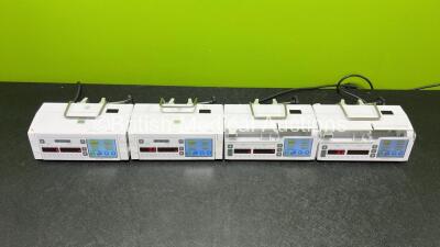 Job Lot Including 2 x Arcomed AG Syramed uSP 6000 Syringe Pumps and 2 x Arcomed AG Volumed uVP7000 (All Power Up) *SN 7106991 / 71076980 / 61126244 / 61126241* - 2