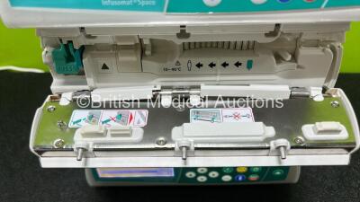 4 x B.Braun Infusomat Space Infusion Pumps (3 x Power Up, 1 x Draws Power, 1 x Missing Battery and 1 x Faulty/Damaged Door - See Photos) *Stock Power Supply Used - Stock Power Supply Not Included* *RI* - 4