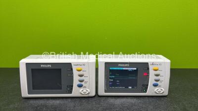 2 x Philips IntelliVue X2 Handheld Patient Monitors Including ECG, SpO2, NBP, Press and Temp Options (1 x Power Up with Stock Battery - Stock Battery Not Included, 1 x No Power, Both Missing Labels / Badges and Both Damaged Casings - See Photos)