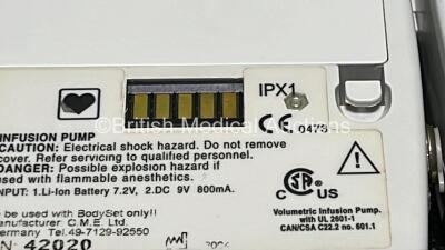 9 x McKinley 545 Bodyguard Epidural Infusion Pumps with 9 x Pump Chargers (8 x Power Up, 1 x No Power, 1 x Mark On Screen, 3 x Damaged Cases and 8 x Missing Batteries - See Photos) - 12