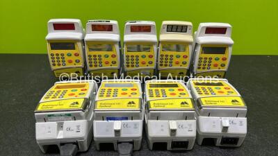 9 x McKinley 545 Bodyguard Epidural Infusion Pumps with 9 x Pump Chargers (6 x Power Up, 2 x No Power, 1 x Loose Casing, 1 x Damaged Case and All Missing Batteries - See Photo)