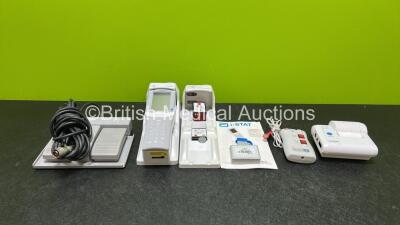 Mixed Lot Including 1 x Abbott i-STAT 1 Portable Analyzer *Mfd - 2008* (Powers Up, Requires Update - See Photos) with 2 x i-STAT Docking Stations, 1 x Abbott i-STAT Battery and 1 x Abbott i-STAT Electronic Simulator, 1 x Toshiba Dual Pedal Footswitch Ref 