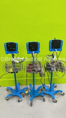 3 x GE Dinamap Carescape V100 Vital Signs Monitors on Stands with Selection of Cables (All Power Up) *S/N SH613030162SA / SDT08340192SP / SDT08250106SP*