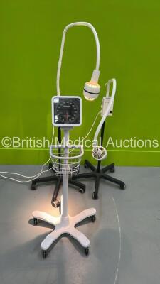 2 x Heine 5000 Patient Examination Lamps on Stand (1 x Powers Up -Both Damaged) and 1 x Blood Pressure Meter on Stand