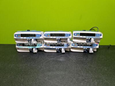 Job Lot Including 3 x Cardinalhealth Alaris GH Syringe Pumps and 3 x Carefusuon Syringe Pumps Including 1 x Alaris PK, 1 x Alaris GH and 1 x Alaris Plus GH (5 x Power Up, See Photos For Errors, 1 x Missing Battery Cover)