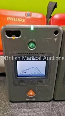 2 x Philips FR3 Defibrillators (Both Power Up) in Carry Case with 2 x LiMnO2 Batteries *Install Before - 2024 / 2023* **SN C16H00314 / C16H00022* - 2