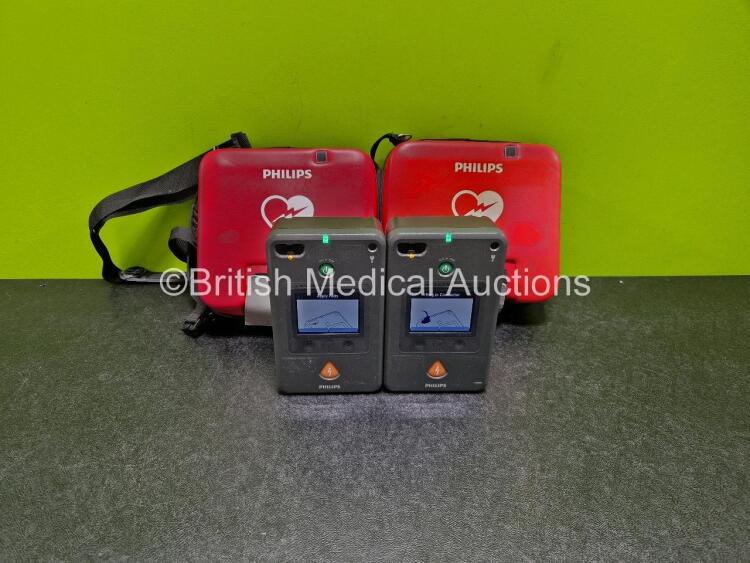 2 x Philips FR3 Defibrillators (Both Power Up) in Carry Case with 2 x LiMnO2 Batteries *Install Before - 2028 / 2023* **SN C16H00100 / C16H00045**