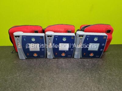 3 x Philips FR2+ Heartstart Defibrillators (All Power Up) in Case with 3 x LiMnO2 Batteries *Install Before - 2029 / 2023 / 2025* **SN 0708283101 / 0607238637 / 0607238227**