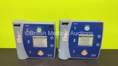 2 x Philips FR2+ Plus Defibrillators (Both Power Up and Pass Self Test with Stock Batteries, Batteries Not Included)