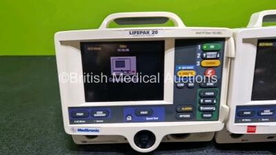 2 x Lifepak 20e Defibrillators / Monitors *Mfd - 2017 / 2007* (Both Power Up) Including Pacer, ECG and Printer Options with 2 x Li-ion Batteries *SN 35551615 / 45975200* - 2