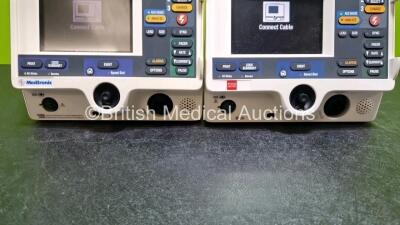 2 x Lifepak 20e Defibrillators / Monitors *Mfd - 2017 / 2007* (Both Power Up) Including Pacer, ECG and Printer Options with 2 x Li-ion Batteries *SN 35551615 / 45975200* - 4