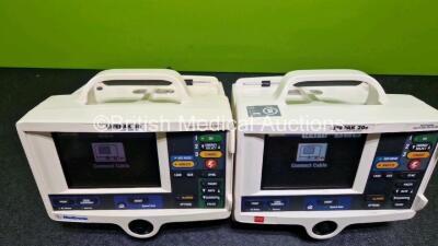 2 x Lifepak 20e Defibrillators / Monitors *Mfd - 2017 / 2007* (Both Power Up) Including Pacer, ECG and Printer Options with 2 x Li-ion Batteries *SN 35551615 / 45975200* - 5